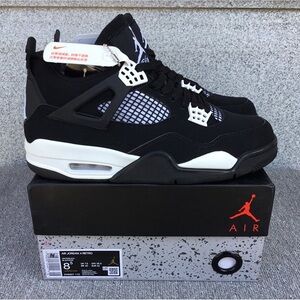 Nike Air Jordan 4 Black and White Sneakers